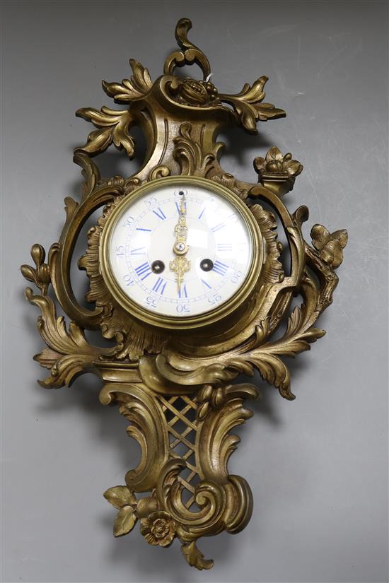A gilt metal Cartel clock Height 51cm